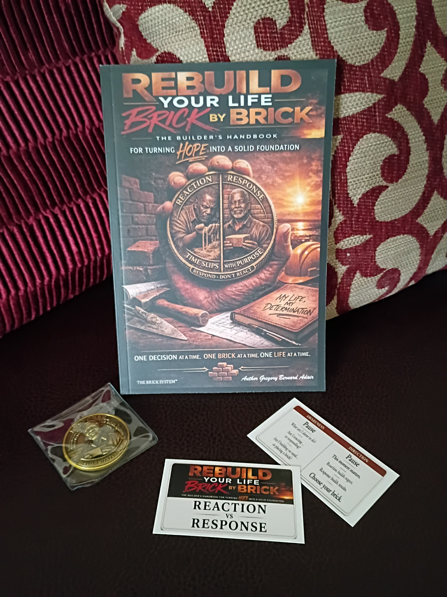 The Brick System Builder’s Kit with book, activation coin, and Reaction vs Response cards